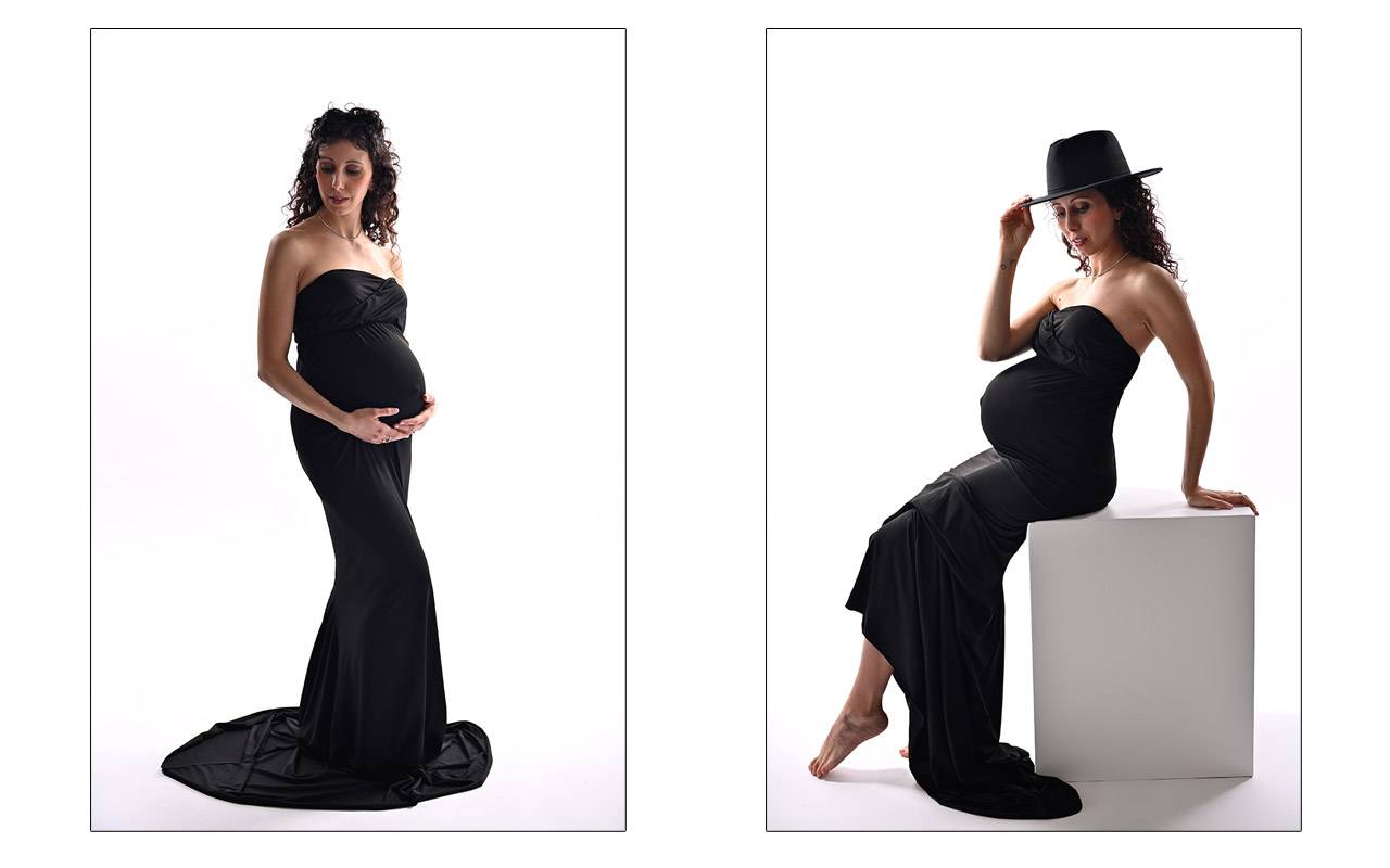 Donna in gravidanza con abito nero fotografata in studio